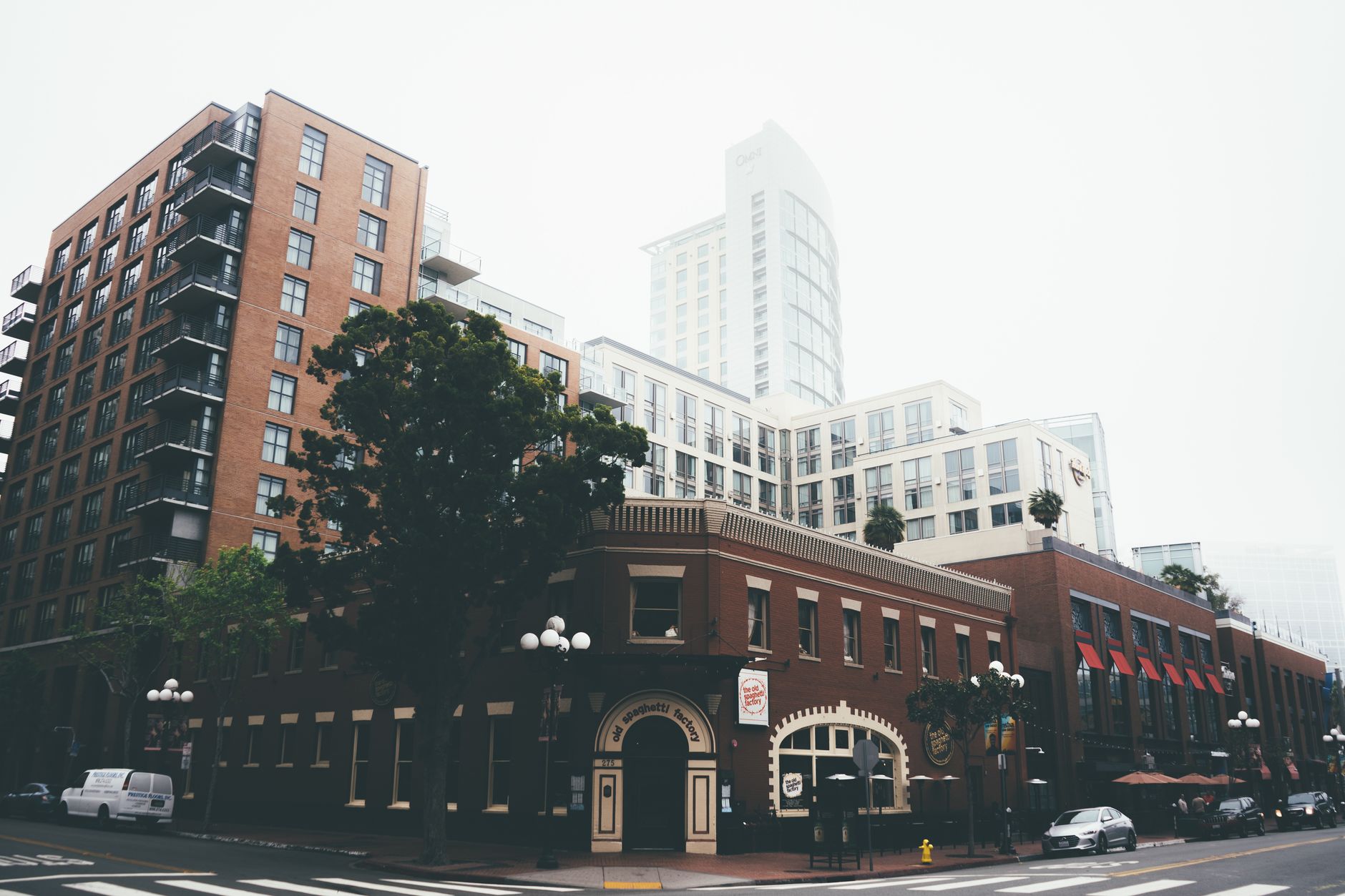 Scenic view of a historic building amidst modern skyscrapers in San Diego.